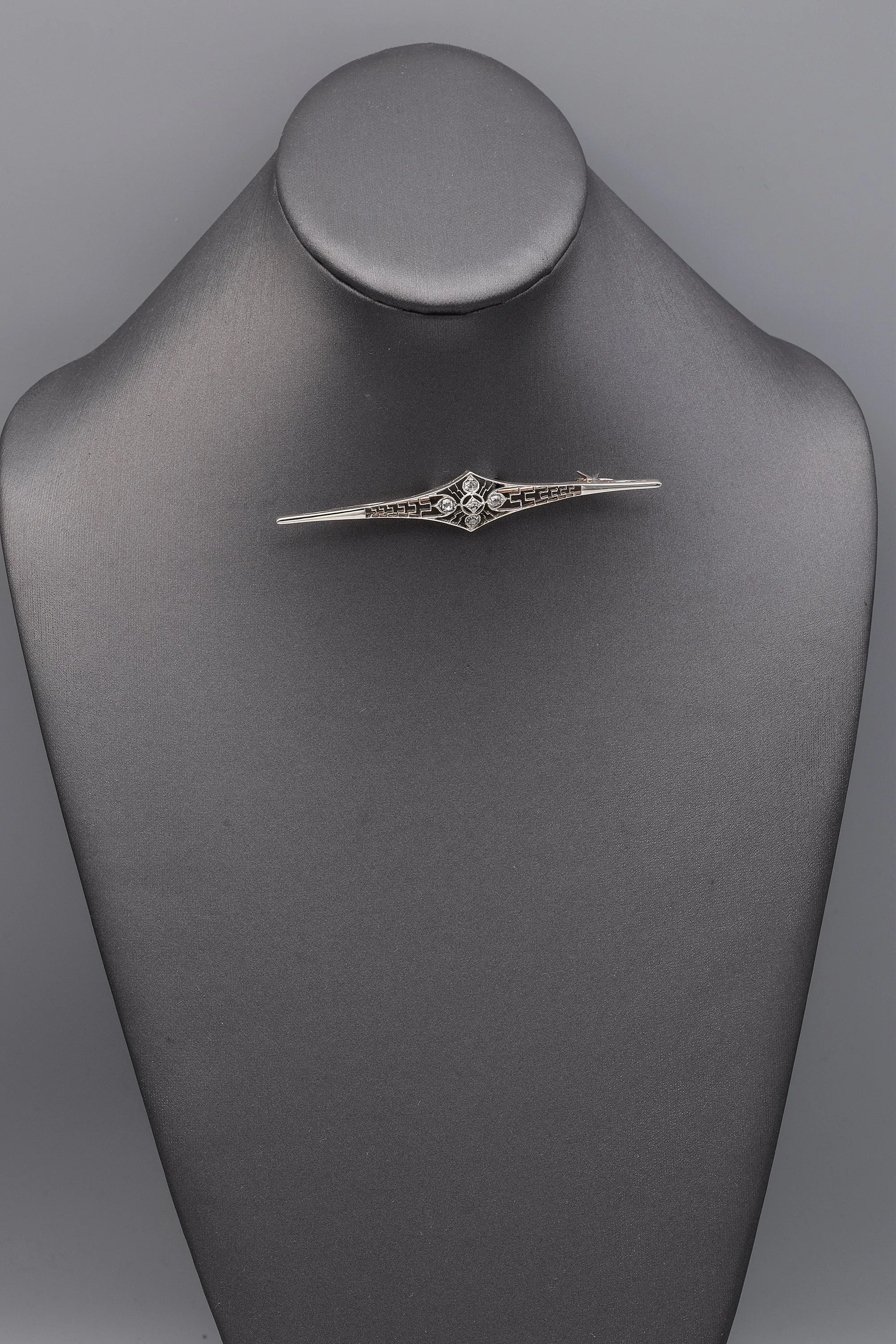Antique 10K White Gold 0.62 TCW Old Mine Cut Diamond Art Deco Brooch Pin